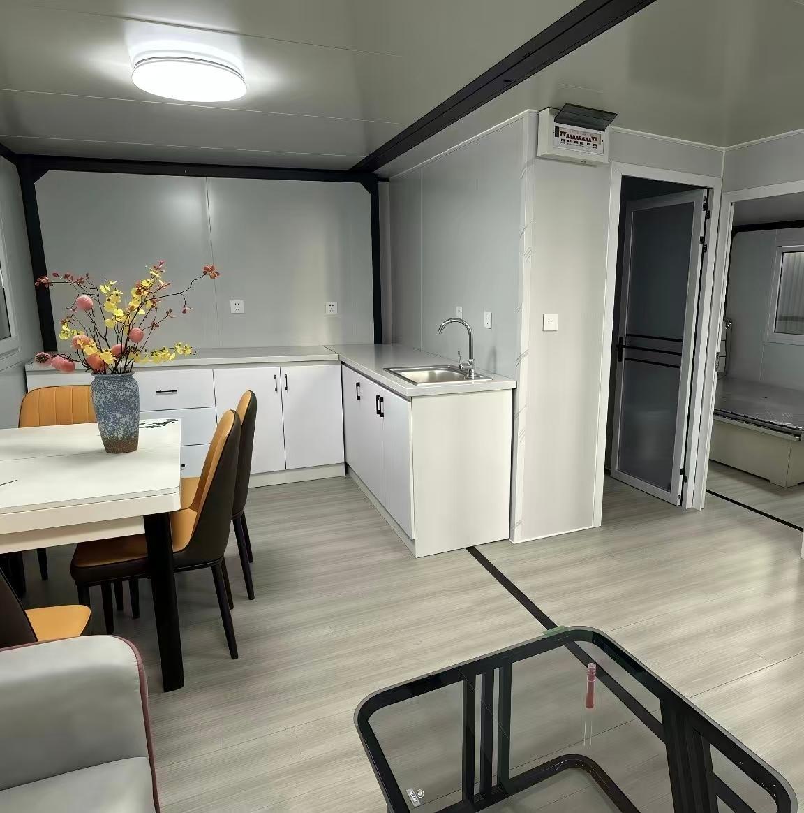 Interior kitchen and dining area of the 40ft double-wing expandable house